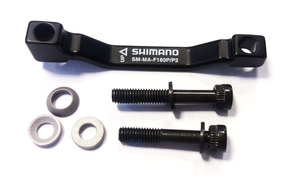 adaptér kotoučové brzdy Shimano přední/zadní 160-180mm post mont servisní balení